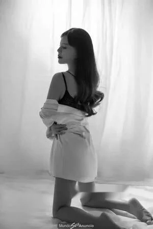 Escort asiática delgada en Alicante