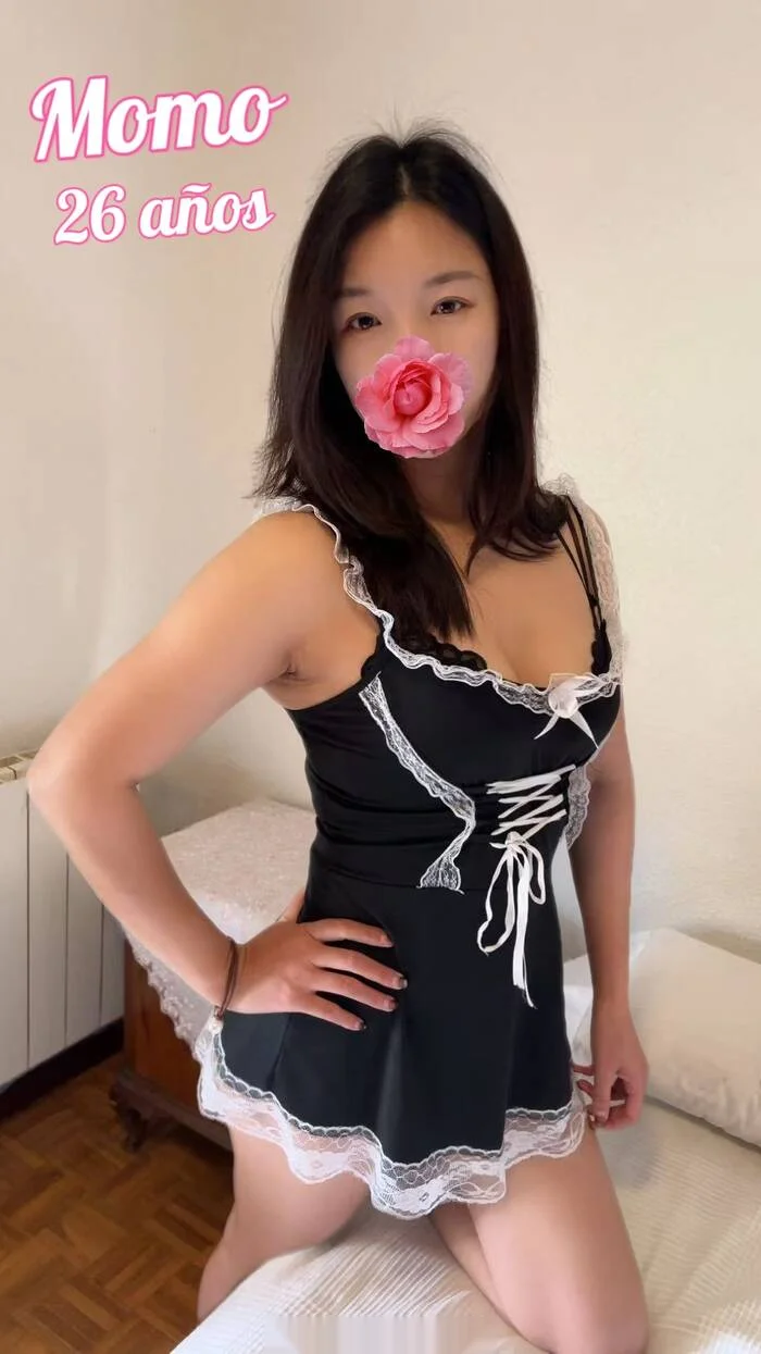 Escort asiática delgada en Madrid
