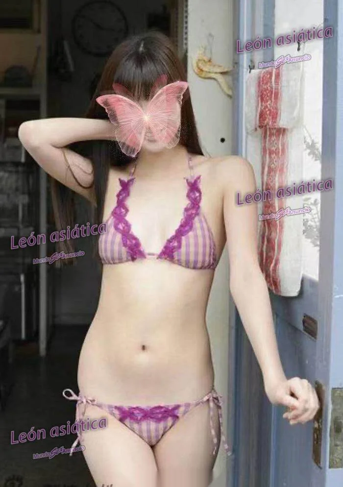 Escort asiática delgada en León