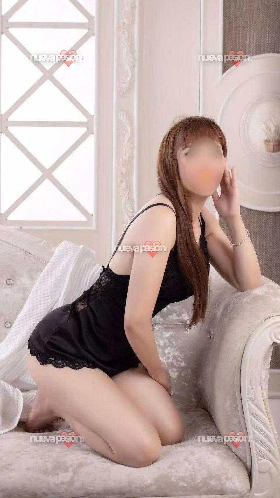 Escort asiática delgada en Torrevieja