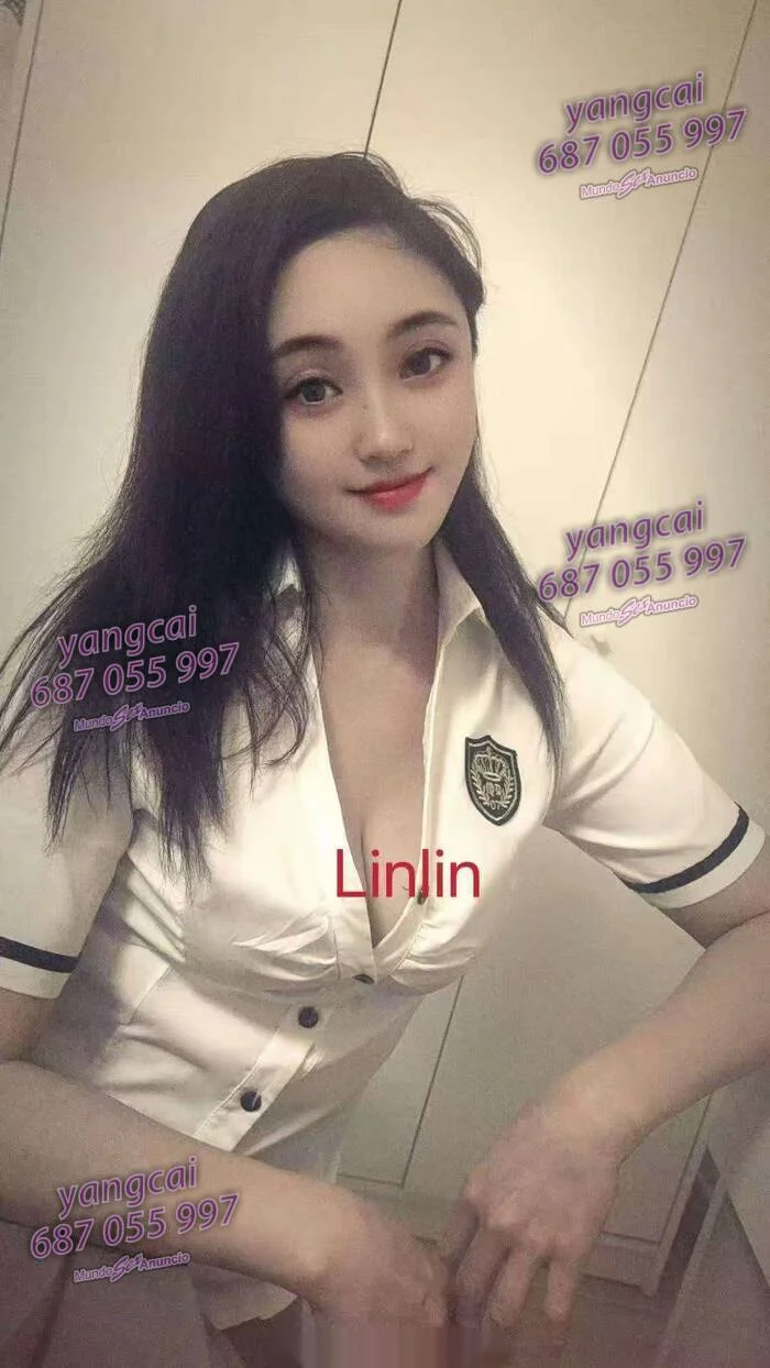 Escort asiática delgada en Valencia